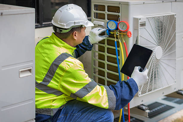 Professional Heat Pump Repair technician working in Newark, AR